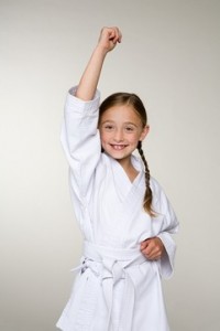 A girl wearing a karate uniform